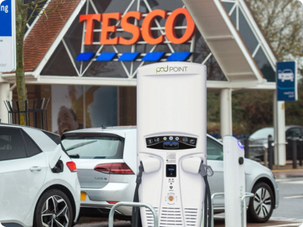 pod point rapid charger at tesco supermarket with VW ID.3 plugged in