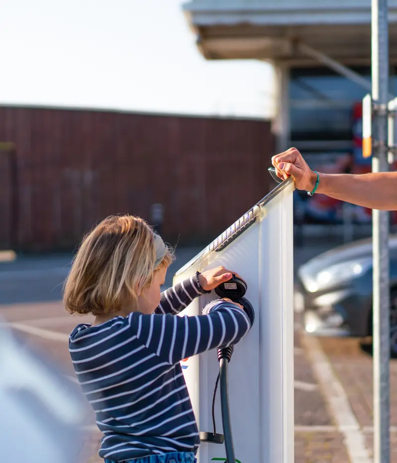 Family Charging an EV at Tesco