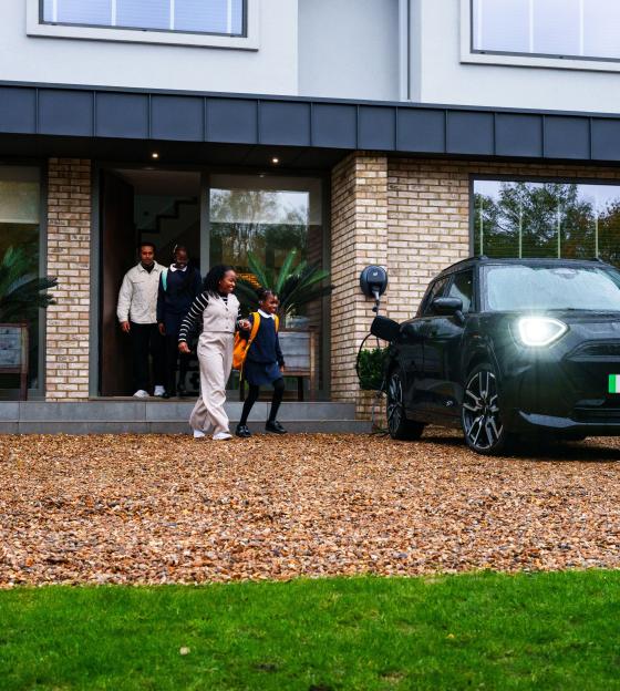 family getting into a fully charged ev.jpg