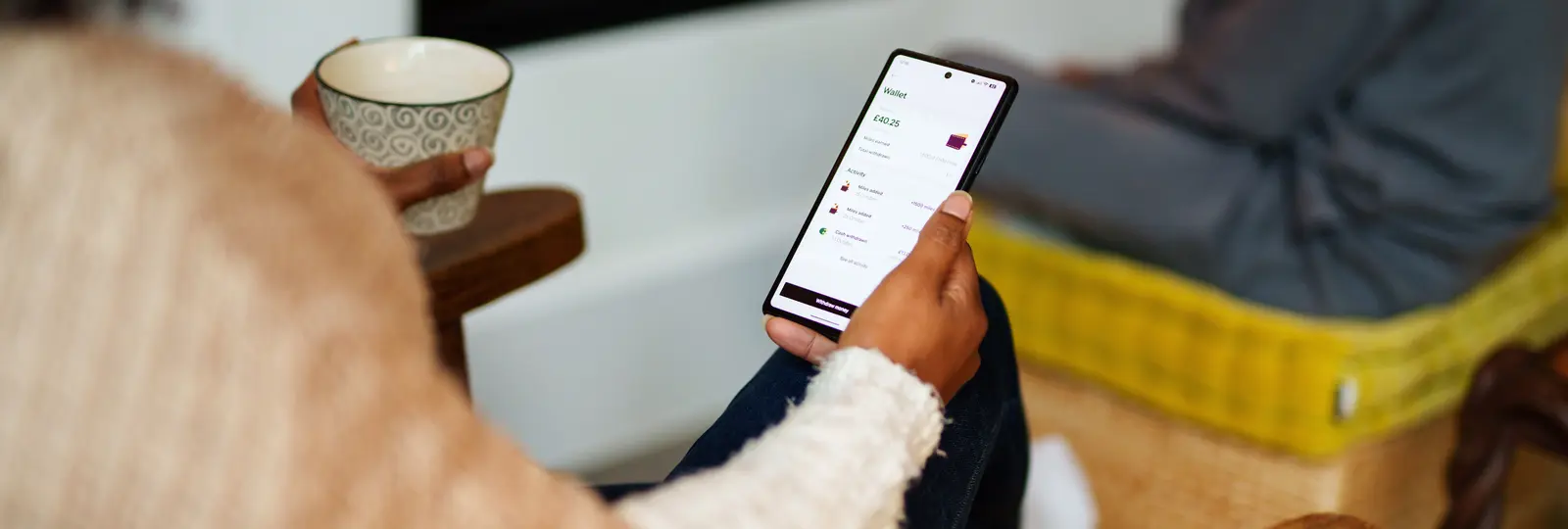 person checking wallet in pod home app