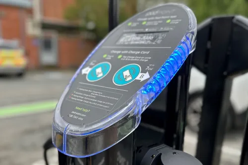 Close up of pod point twin charger charging head