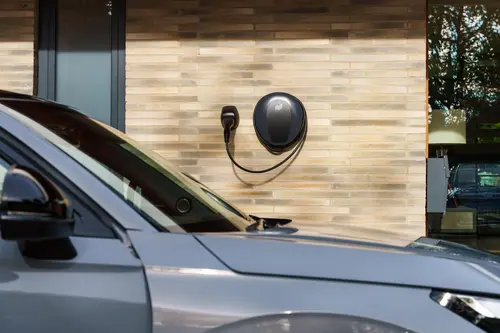 Tethered Pod Point Solo 3S on the side of a house