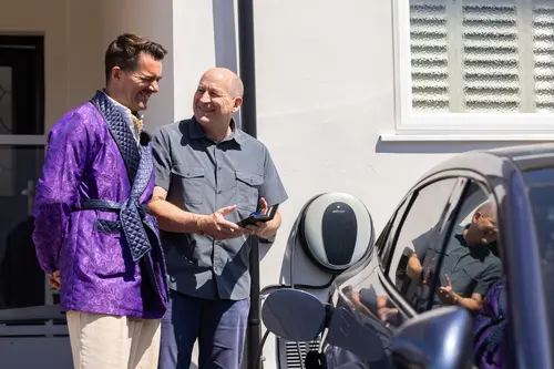 Pod customer laughing with Troy Hawke 